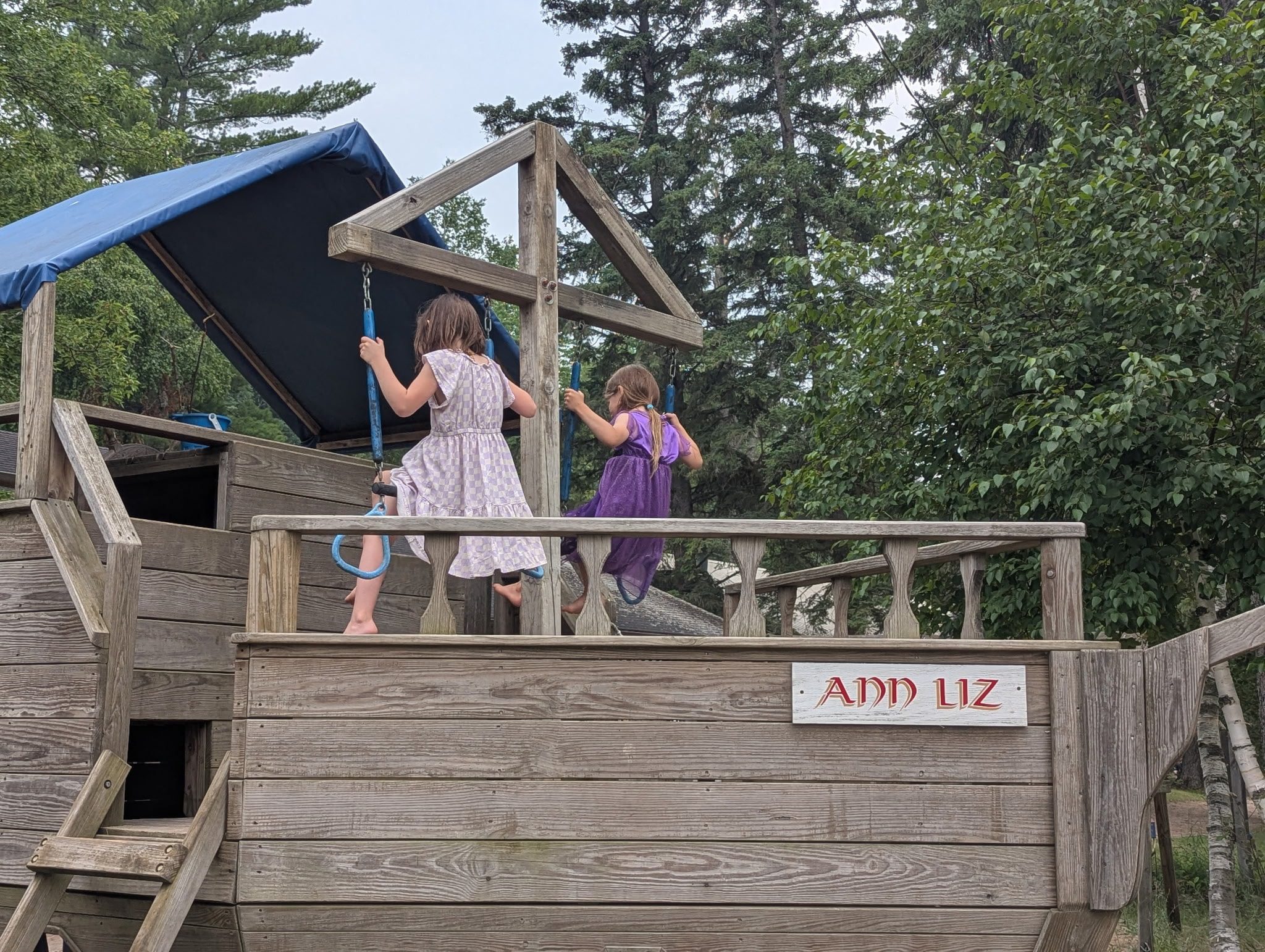 Two girls playing on playground