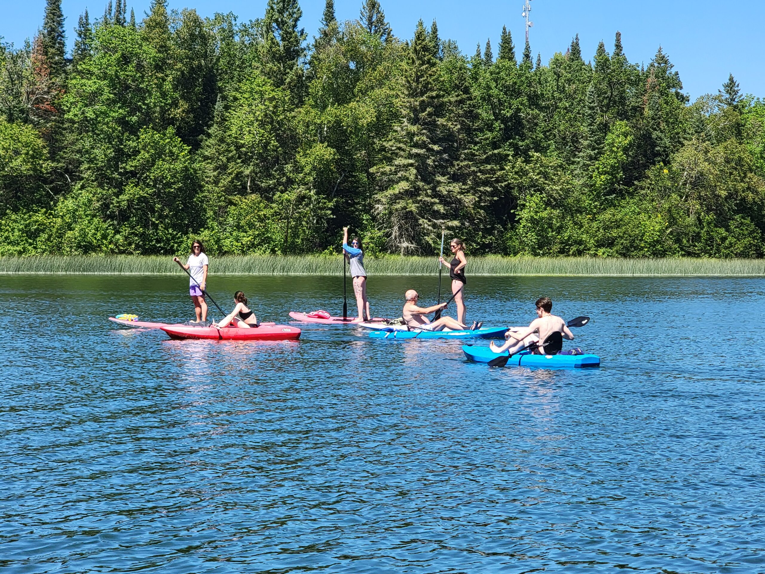 Group kayaking on Big Elbow Lake