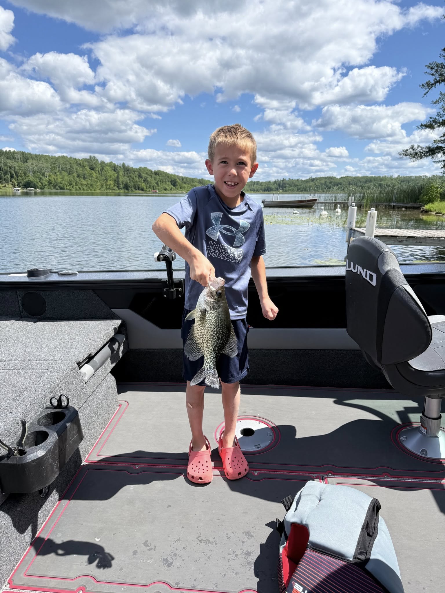 Child with a large crappie